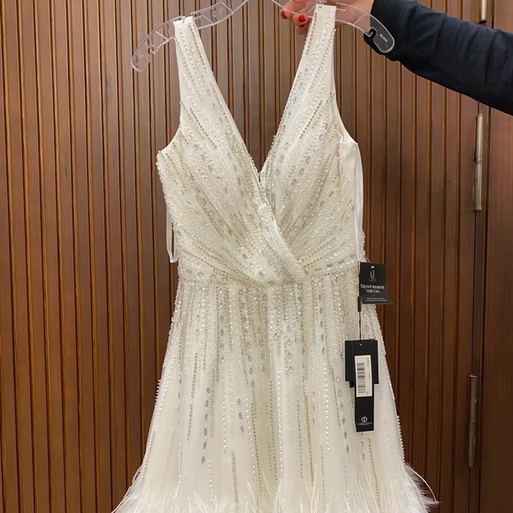 Dresses & Skirts - Brand New Beaded dress. Size 10, runs small.